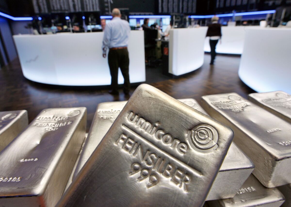 Silver bullion bars are displayed in the trading room of the stock exchange in Frankfurt, Germany. 