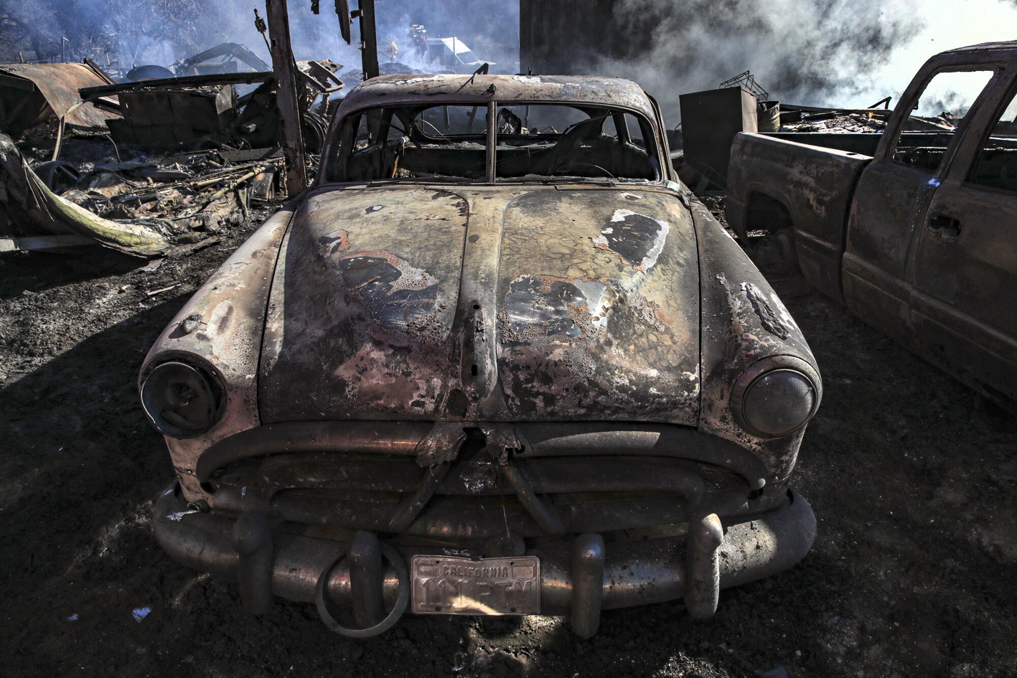 A vehicle destroyed by the South fire that swept the Lytle Creek area north of Fontana.