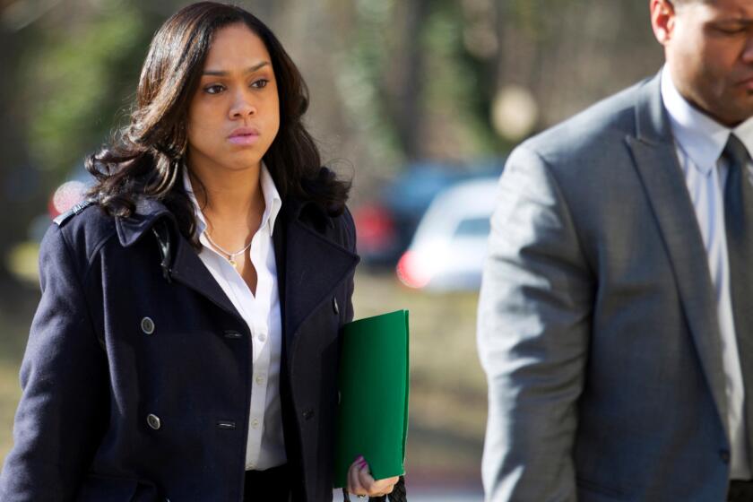 Baltimore State's Atty. Marilyn J. Mosby arrives a courthouse.