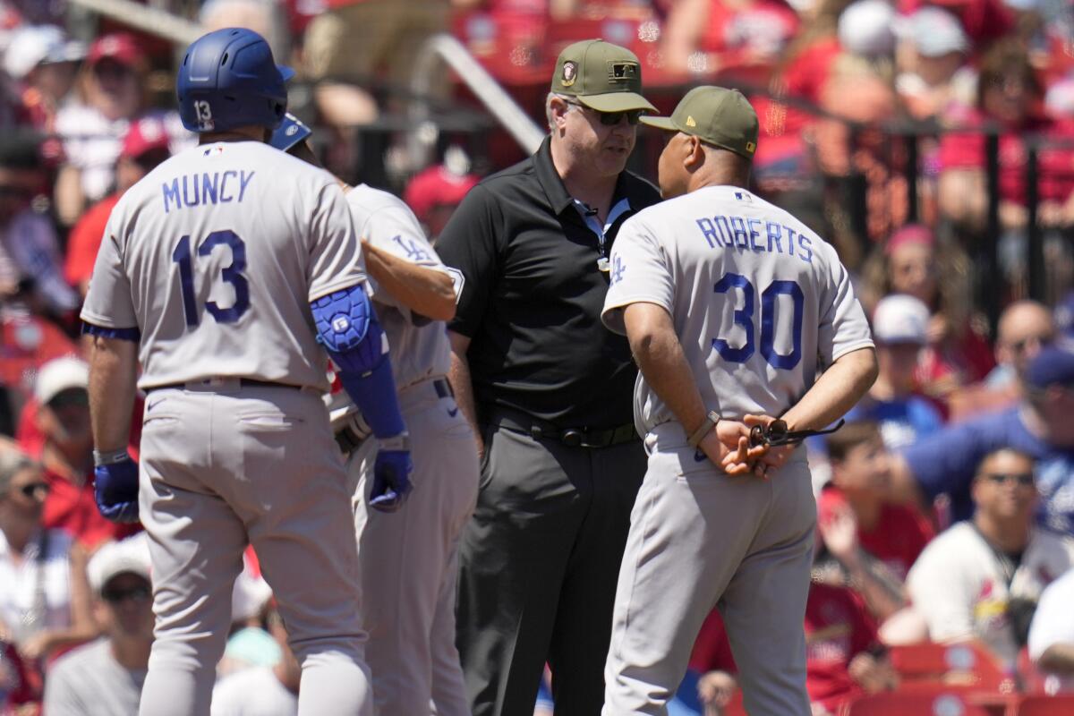 Los Angeles Dodgers pitcher Clayton Kershaw (22) argues with first base  umpire Brian O'Nora during an MLB regular season game against the Chicago  Cubs Stock Photo - Alamy