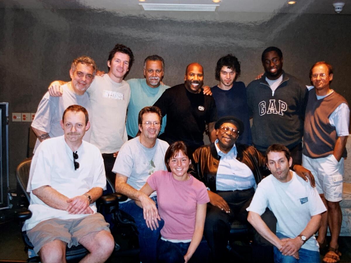Nathan East (center back row) with Eric Clapton and B.B. King (center front row)