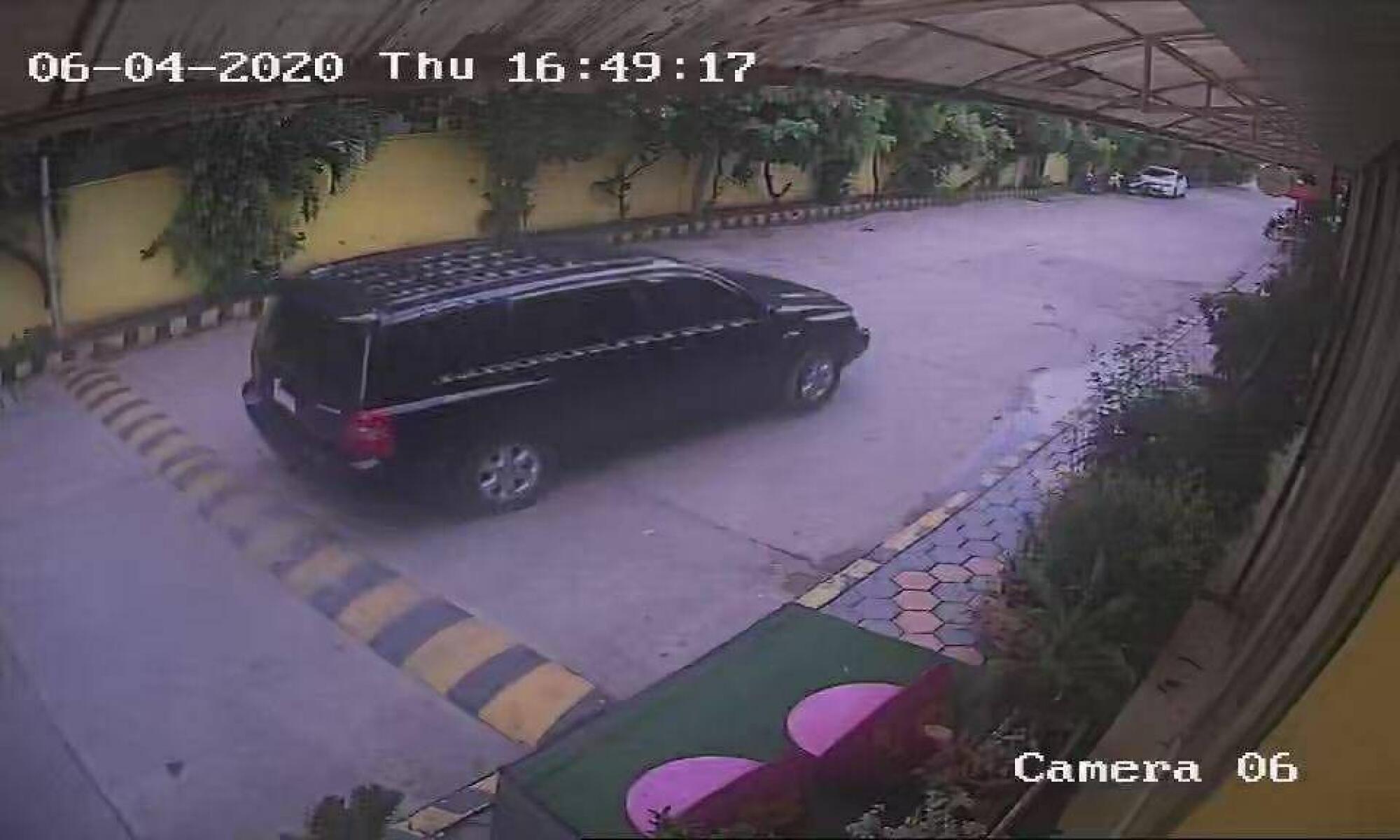 Security camera footage shows a Toyota SUV leaving the spot where Wanchalearm Satsaksit