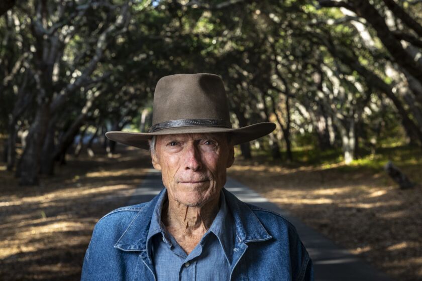 A portrait of Oscar-winning director Clint Eastwood, 91, photographed amongst oak trees