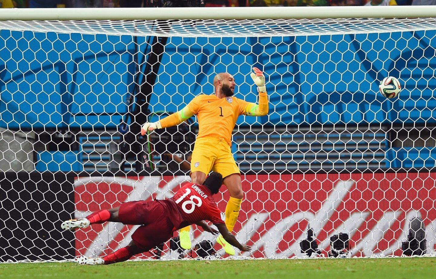 Portugal midfielder Silvestre Varela sends a diving header past U.S. goalkeeper Tim Howard in the final seconds of their World Cup Group G game on Sunday at Arena Amozonia in Manaus, Brazil.