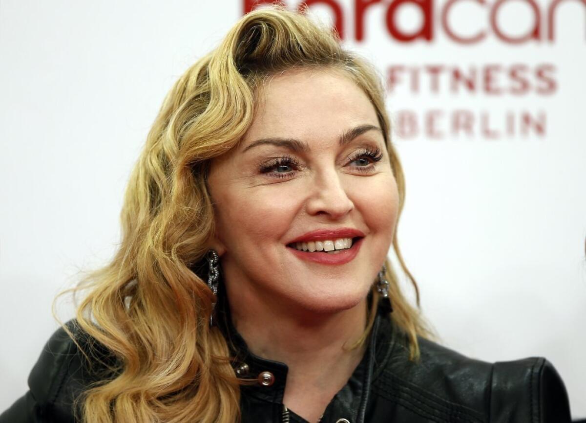 Madonna, seen here in late 2013 in Berlin, clarified on Saturday her use of a racial slur.