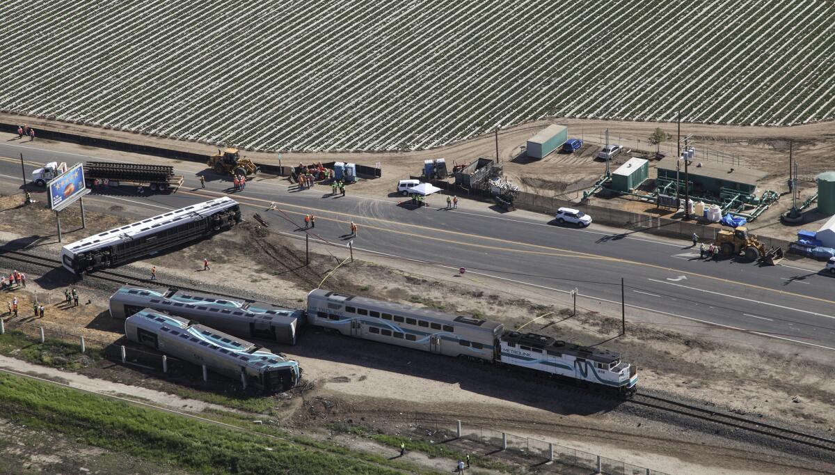Federal investigators will examine whether the intersection near the site of a Metrolink train derailment Tuesday was "adequately illuminated."