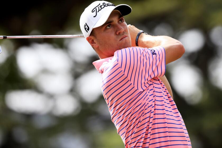 Justin Thomas watches his tee shot at No. 4 during the third round of the Sony Open on Saturday.