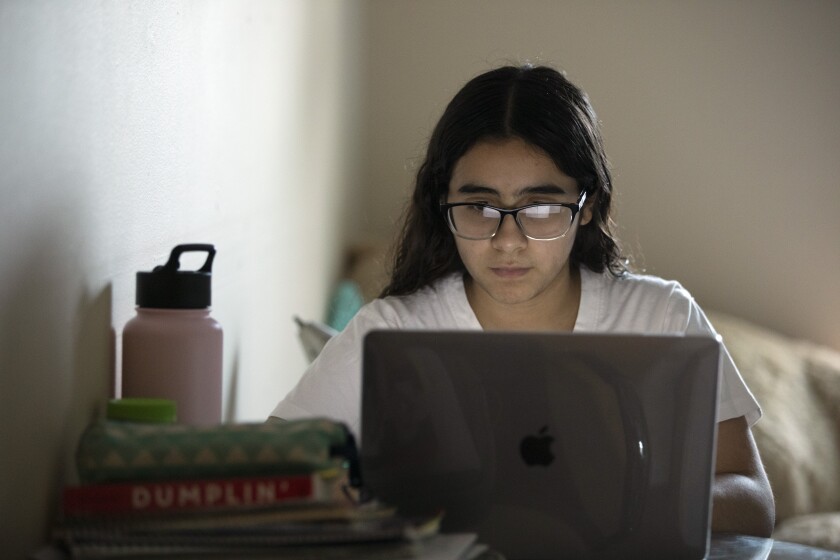 Amanda Alarcon, a Los Angeles High student accepted to UCLA and UC Berkeley, studies at her home.