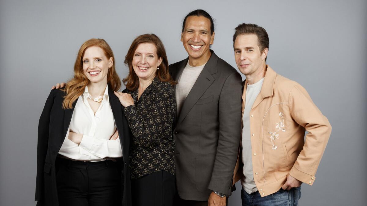 "Woman Walks Ahead" star Chastain, left, director Susanna White, Greyeyes and Sam Rockwell pose together at the Toronto International Film Festival.