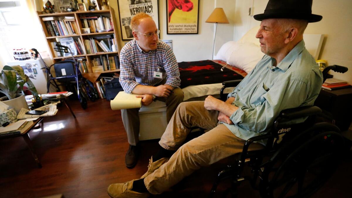 Lewis MacAdams, right, the 'Grand Old Man' of the Los Angeles River, visits at his home in the Kingsley Manor retirement community with historian Michael Block, who records his every word as they plunge into work on an autobiography.