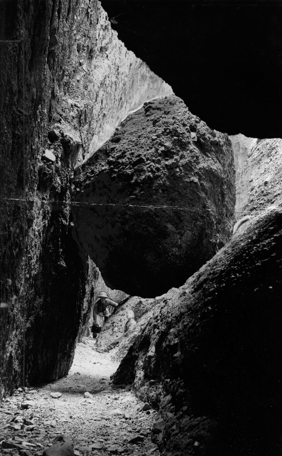 Boulders, some weighing 50,000 tons, stick between walls in Pinnacles Monument. April 11, 1954. (Los Angeles Times Library)