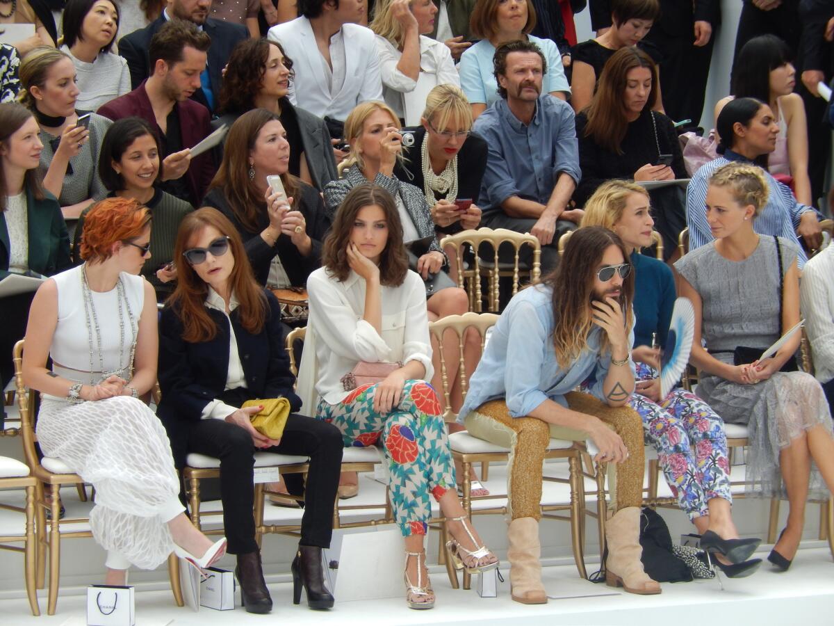 Front row at Chanel, from left, actors Kristen Stewart, Isabelle Huppert, Alma Jodorowsky and Jared Leto, and models Alice Dellal and Poppy Delevingne.