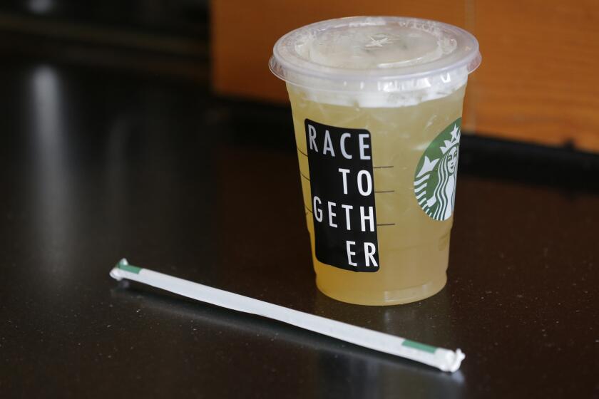 For a week, Starbucks employees wrote "Race Together" on customers' cups or used a sticker bearing the phrase. Above, an iced drink bearing a sticker in a Seattle store on Wednesday.