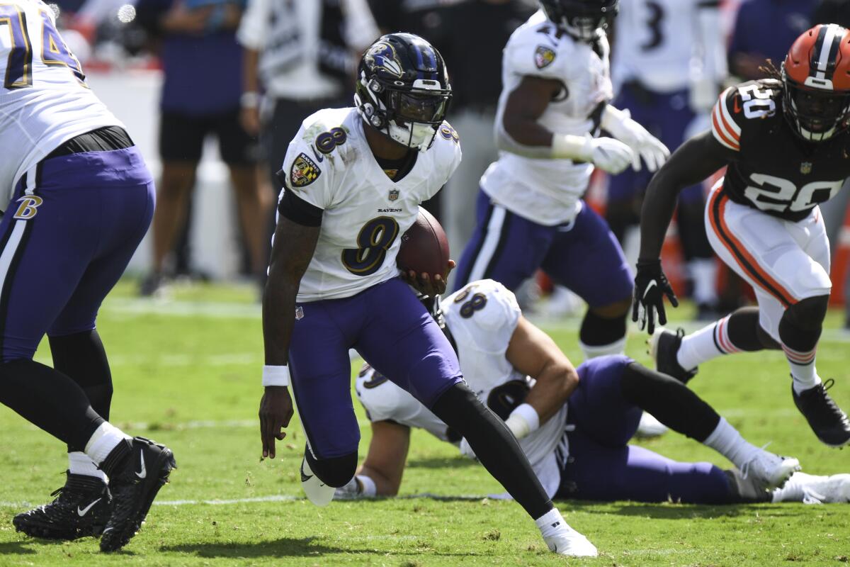 Baltimore Ravens quarterback Lamar Jackson runs against the Cleveland Browns on Sunday.