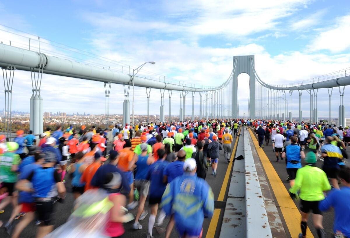 Runners cross the Verrazano-Narrows Bridge at the start of the New York City Marathon on Sunday.