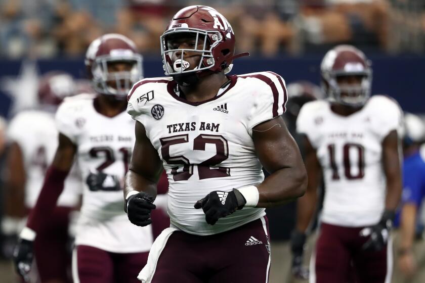 ARLINGTON, TEXAS - SEPTEMBER 28: Justin Madubuike #52 of the Texas A&M Aggies during the Southwest Classic at AT&T Stadium on September 28, 2019 in Arlington, Texas. (Photo by Ronald Martinez/Getty Images)