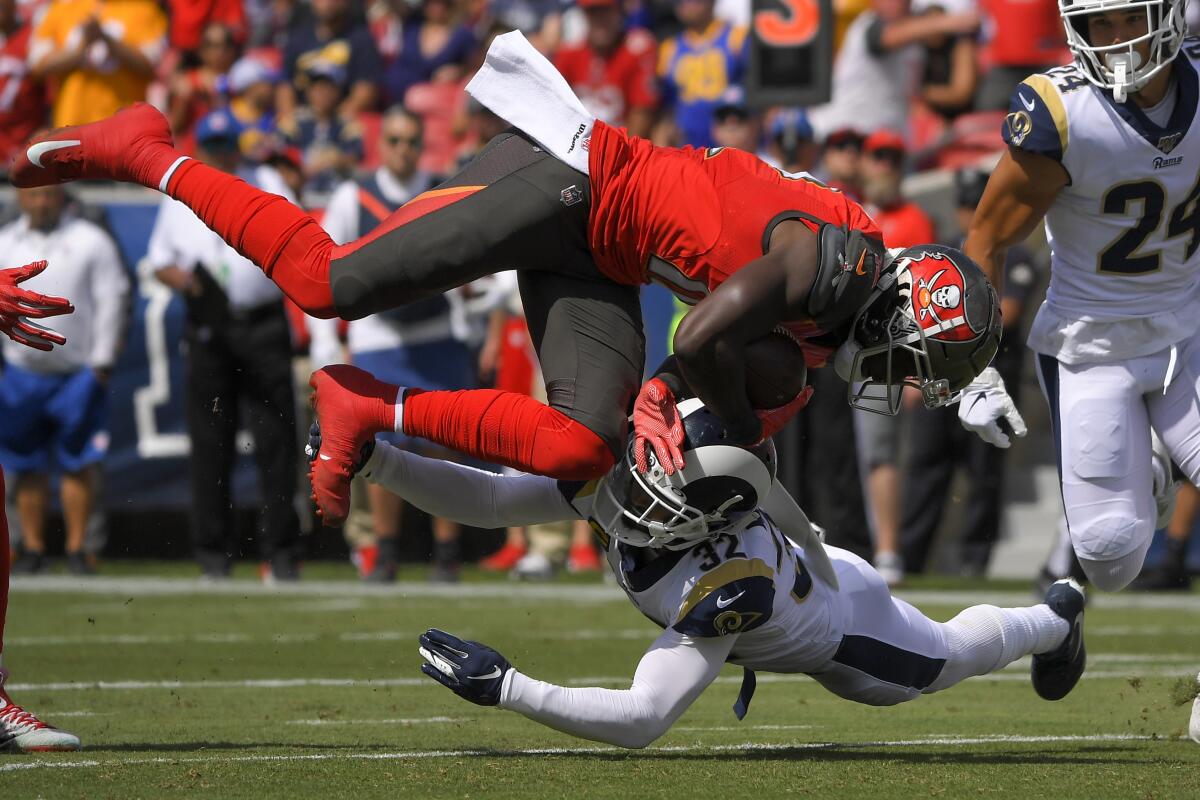 Winston throws 4 TD passes, Buccaneers outlast Rams 55-40 - The