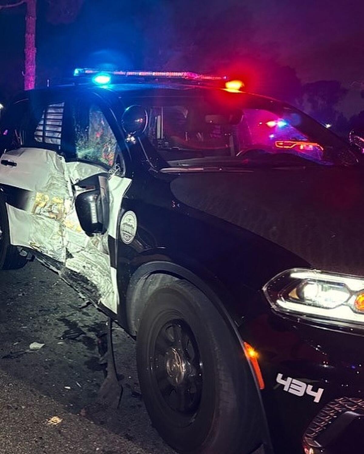 A DUI driver crashed into the scene of a fatal collision investigation in Fountain Valley Sunday, striking a police car.