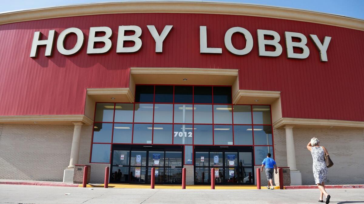Hobby Lobby will pay $3 million to settle federal charges that it acquired smuggled Iraqi artifacts, and it will forfeit the goods.
