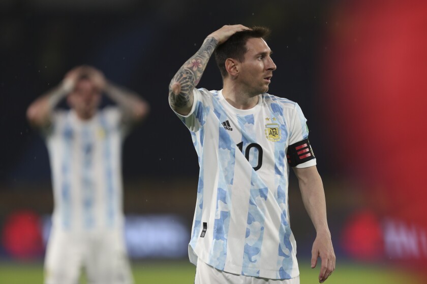 Argentina's Lionel Messi gestures during a qualifying soccer match for the FIFA World Cup Qatar 2022 against Colombia at the Metropolitano stadium in Barranquilla, Colombia, Tuesday, June 8, 2021. (AP Photo/Fernando Vergara)