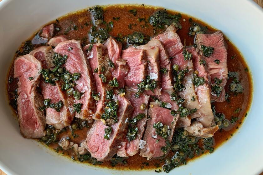 An umami-packed kale and caper sauce adds salinity to half-salted steaks, the quickest way to having steak at home.