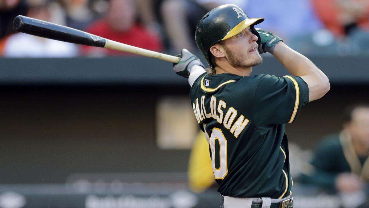 Oakland Athletics third baseman Josh Donaldson hits a solo home run against the Baltimore Orioles on Friday.