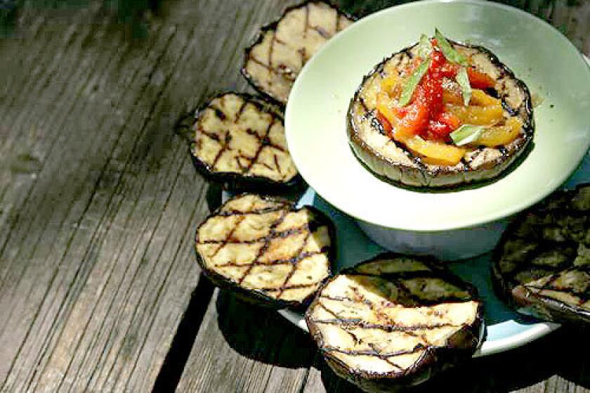 Thick slices of eggplant brushed with olive oil capture a grill's smokiness, while slow-roasted red and yellow peppers add a sweet dimension. Recipe: Grilled eggplant with red and yellow peppers