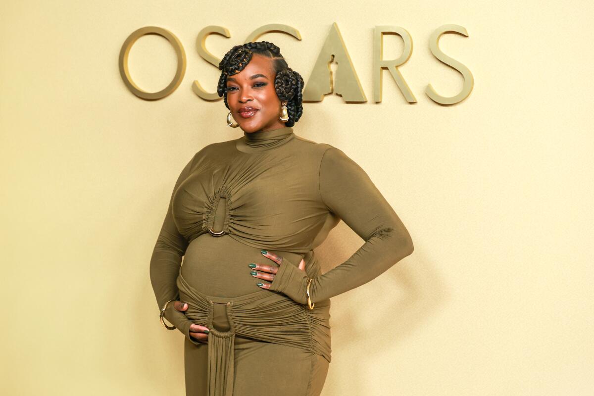 Wunmi Mosaku on the beige carpet for the Oscars Nominees Luncheon