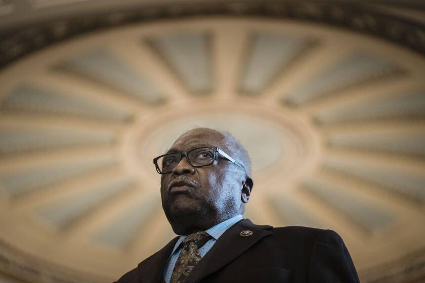 WASHINGTON, DC - JANUARY 19: House Majority Whip Jim Clyburn (D-SC) speaks beside members of the Congressional Black Caucus at the Senate side of the U.S. Capitol on Wednesday, Jan. 19, 2022 in Washington, DC. The Senate heads towards a vote on whether or not to enact sweeping voting rights reforms. (Kent Nishimura / Los Angeles Times)
