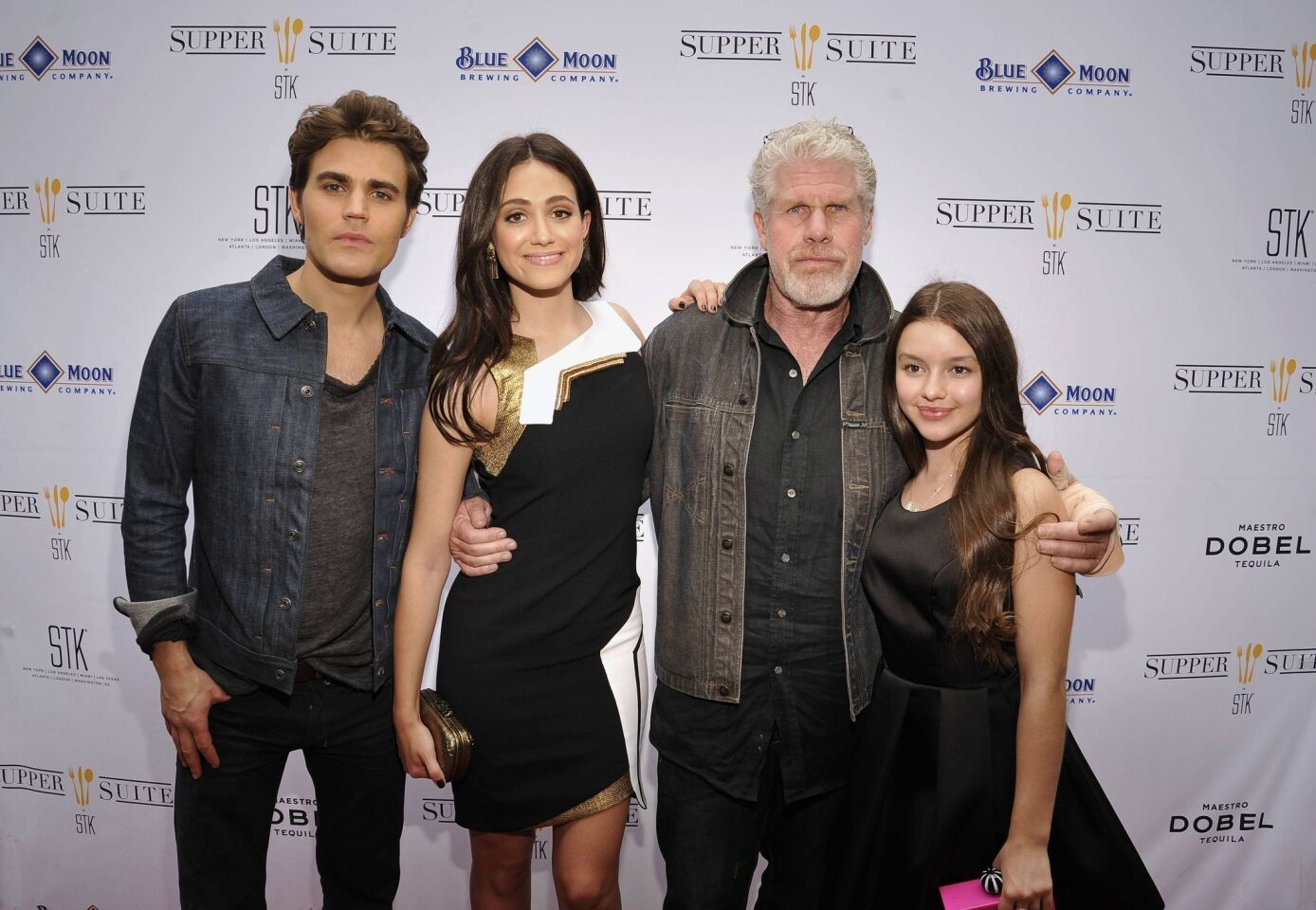 Posing on the red carpet during the "Before I Disappear" SXSW premiere party are, from left: Paul Wesley, Emmy Rossum, Ron Perlman and Fatima Ptacek.