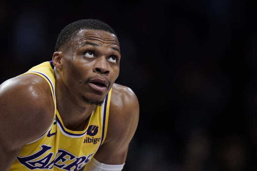 Los Angeles Lakers' Russell Westbrook watches a free throw during second half of an NBA preseason.