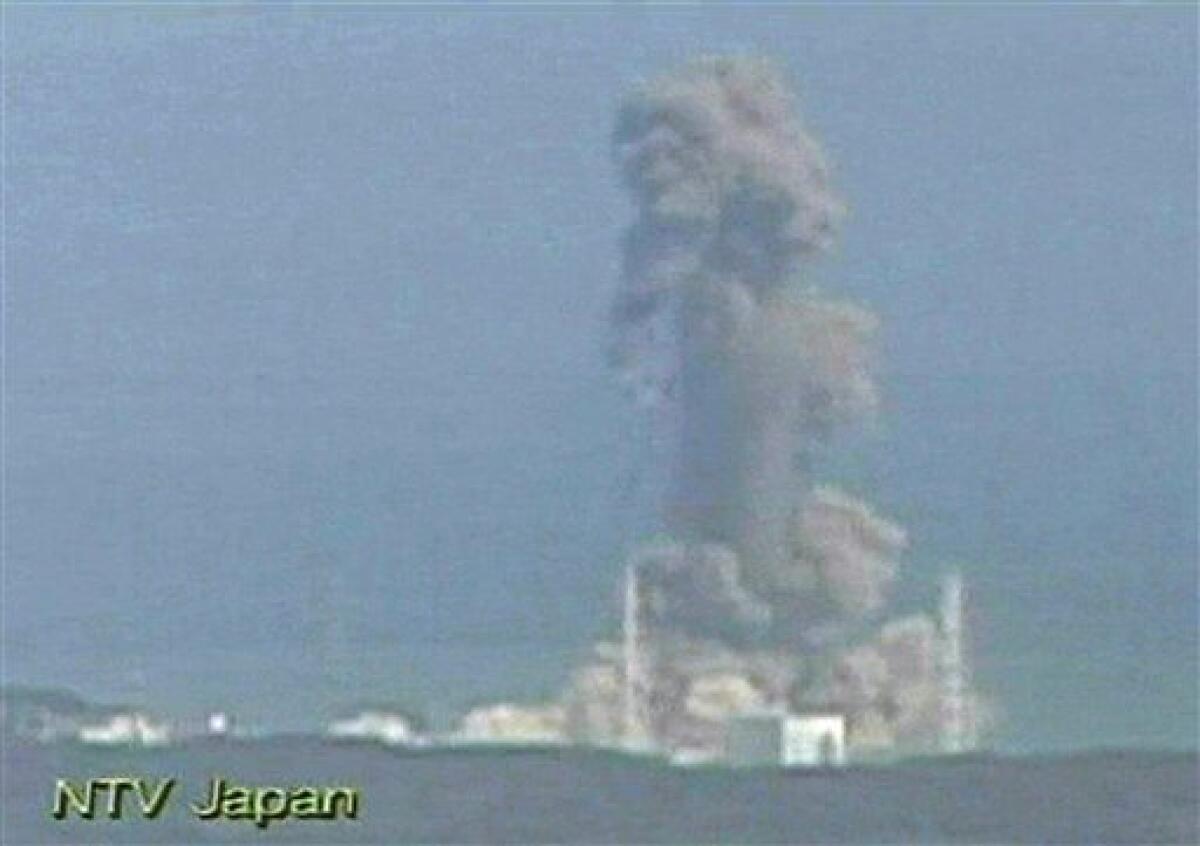 In this image made off Japan's NTV/NNN Japan television footage, smoke ascends from the Fukushima Dai-ichi nuclear plant's Unit 3 in Okumamachi, Fukushima Prefecture, northern Japan, Monday, March 14, 2011. The second hydrogen explosion in three days rocked Japan's stricken nuclear plant Monday, sending a massive column of smoke into the air and wounding 11 workers. (AP Photo/NTV/NNN Japan) MANDATORY CREDIT, JAPAN OUT, TV OUT, NO SALES, EDITORIAL USE ONLY
