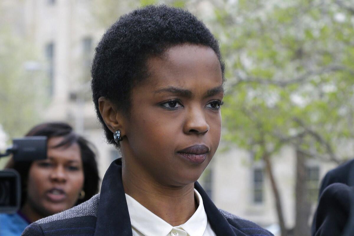 Singer Lauryn Hill, shown in April walking from federal court in Newark, N.J., started a three-month prison term in Connecticut on Monday.