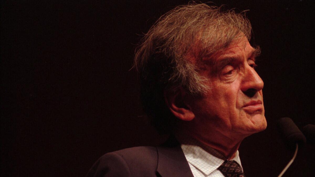 Elie Wiesel, a Nobel Peace Prize winner and Holocaust survivor speaks Tuesday, April 16, 1996, at an international symposium on human rights at the University of Nebraska.