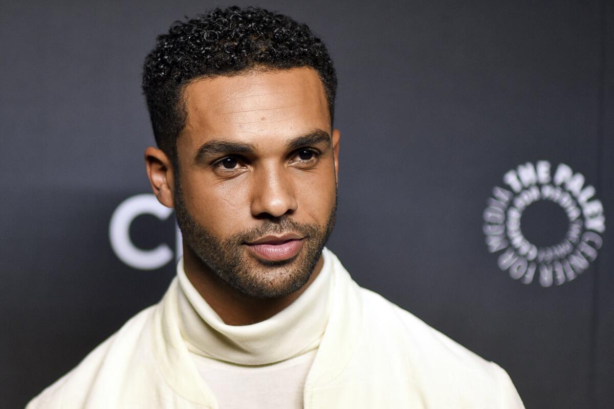 FILE - Lucien Laviscount attends a screening of "Emily in Paris" during PaleyFest on Sunday, April 10, 2022, at the Dolby Theater in Los Angeles. During interviews in recent weeks, The Associated Press asked celebrities promoting their own projects in Europe what they planned to watch this winter season. Laviscount, who plays Emily's love interest Alfie in "Emily in Paris", chases said he was into “anything inspiration, inspiring stuff.” (Photo by Richard Shotwell/Invision/AP, File)