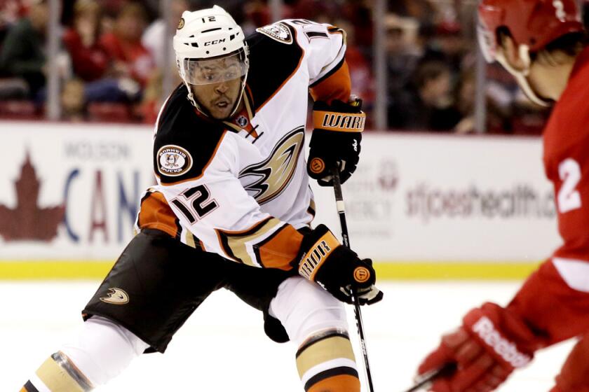 Ducks right wing Devante Smith-Pelly brings the puck up ice against the Red Wings on Saturday.