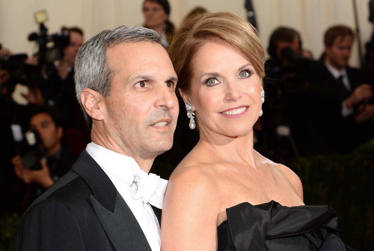John Molner and Katie Couric, shown at New York's Met Gala red carpet in May, got married Saturday in East Hampton.