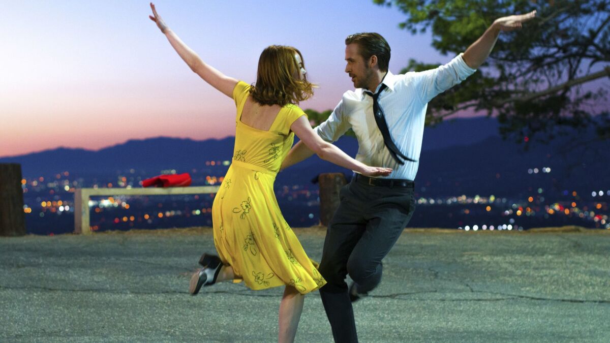Ryan Gosling, right, and Emma Stone in a scene from, "La La Land," screening Thursday, Aug. 9, at the Rooftop Cinema Club at the Manchester Grand Hyatt.
