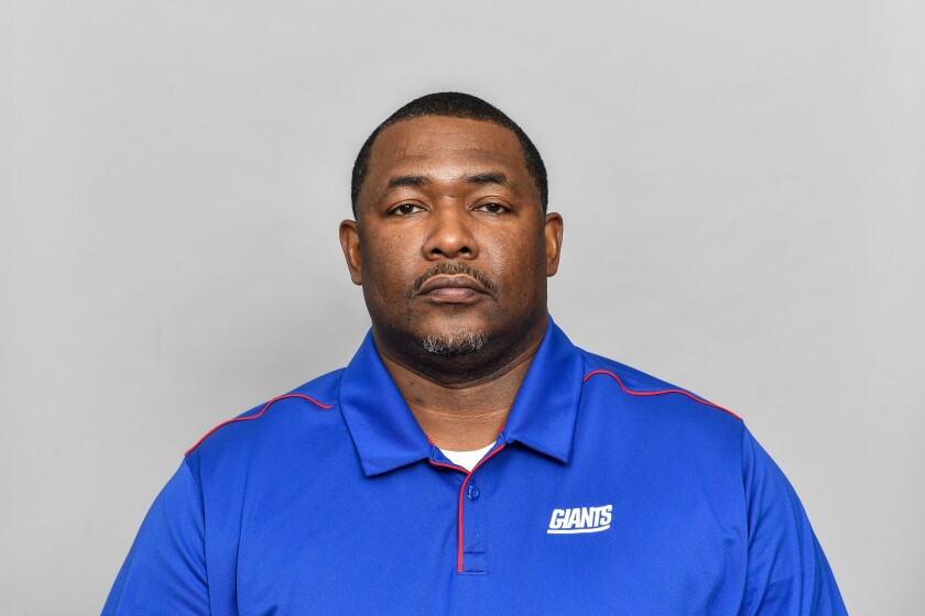 FILE - In this March 5, 2020, file photo, Patrick Graham, of the New York Giants NFL football team, poses for a photo in East Rutherford, N.J. The way the Giants defense has played this season, coordinator Graham is almost certainly going to be considered for some head coaching jobs at the end of the season. The 41-year-old Graham has transformed a defense that gave up 451 points last season into one that is now ranked 10th in the league and fourth against the run. (AP Photo/File)