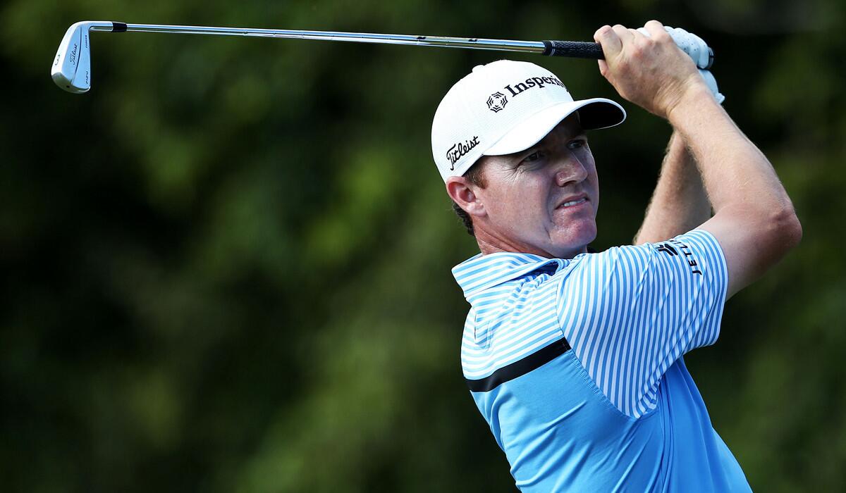 Jimmy Walker hits his tee shot at No. 15 on Saturday during the third round of the Sony Open at Waialae Country Club.