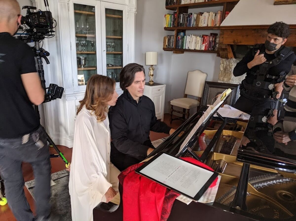 Hila Plitmann and Hershey Felder film a scene from "Dante and Beatrice in Florence."