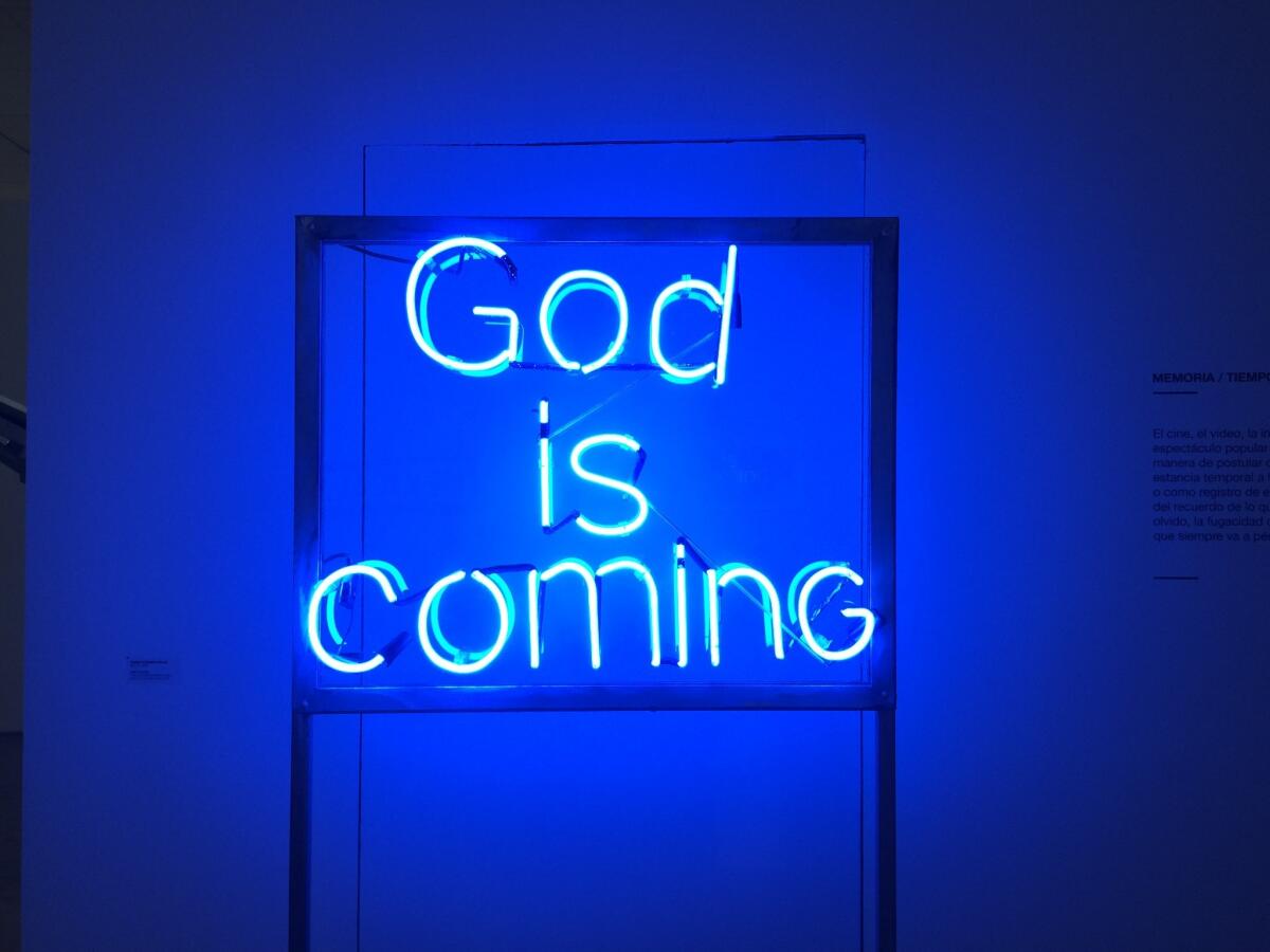 "God is Coming," a 2008 work in neon by artist Roberto Romero Molina.