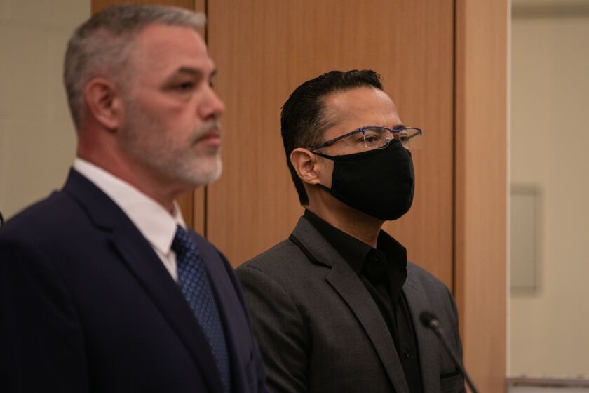 San Diego, CA - May 09:  Jose Soto, right, stands next to his lawyer Allen Hall 