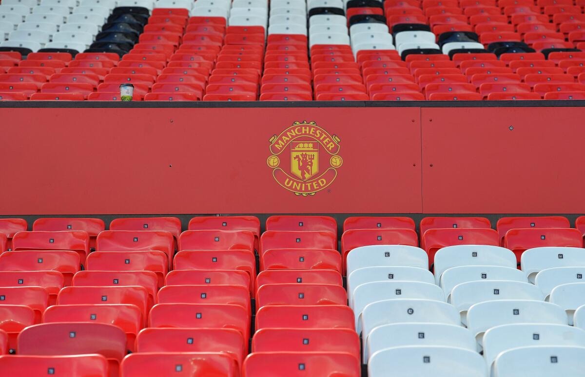 Empty seats are seen at Old Trafford where a Premier League match between Manchester United and Bournemouth was canceled after a suspicious package was found in the stadium.