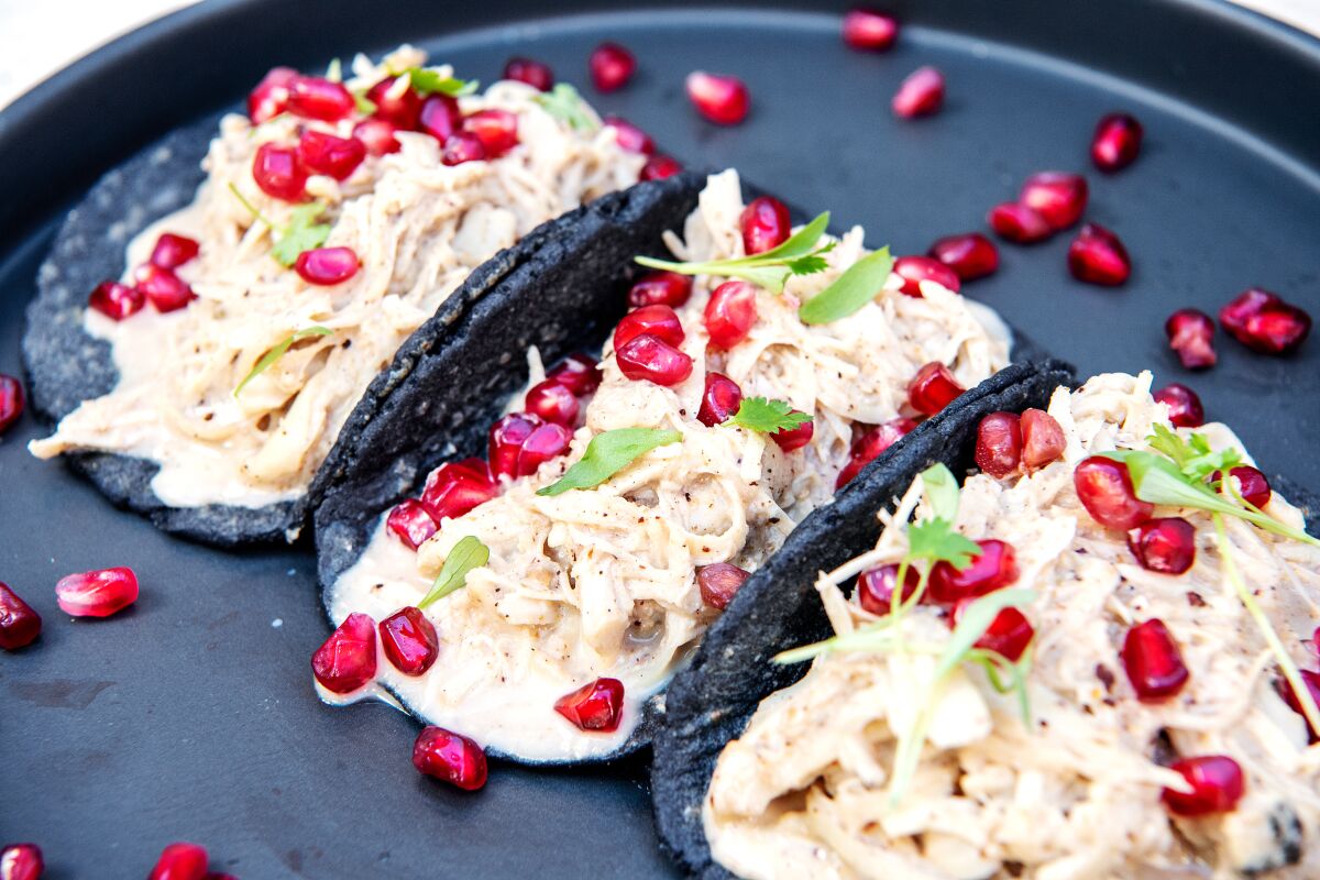Chicken white mole tacos from Macheen