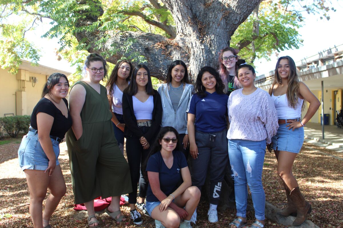 The 2020 Mission Bay High School yearbook leadership team, with chief editor Kimberly Torres kneeling in the front.