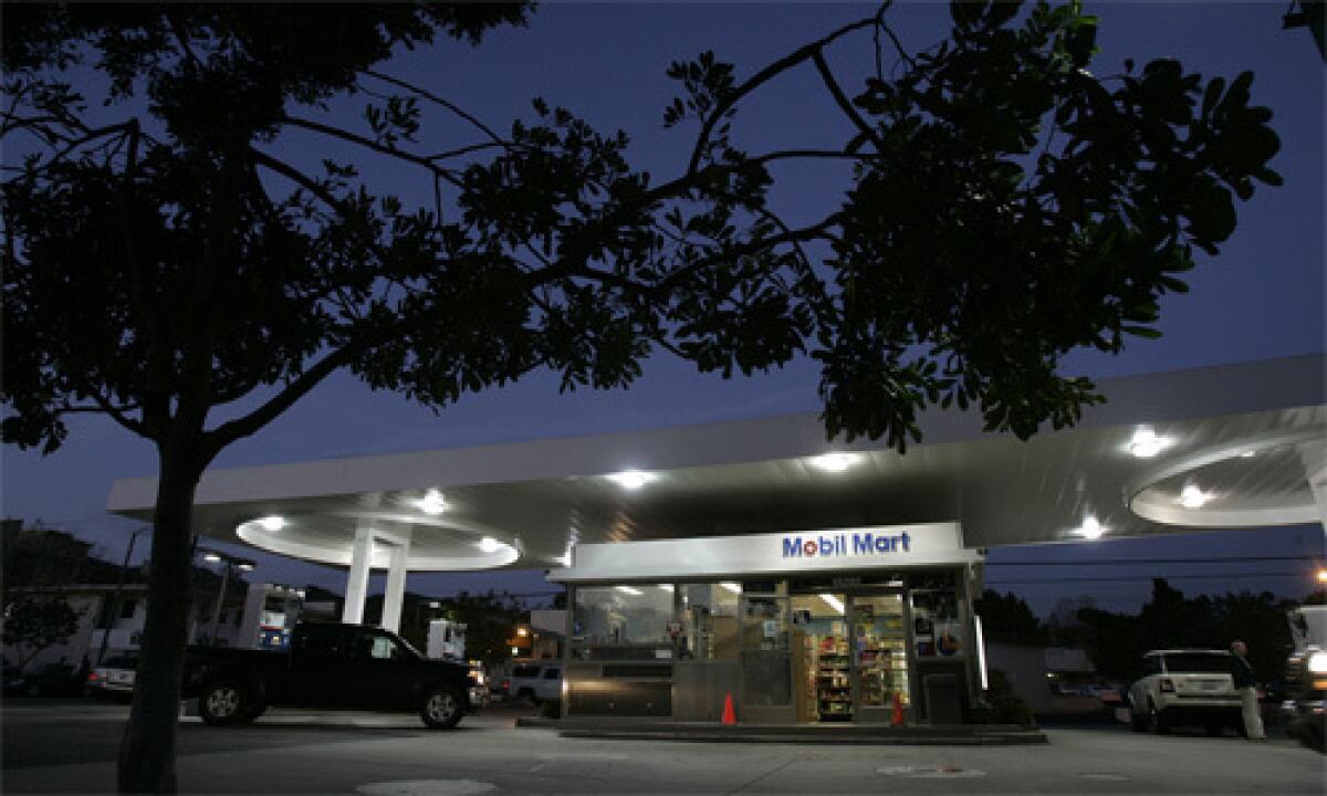 SCENE: Carlos Gutierrez reportedly drove to this Mobil station in Pacific Palisades early Monday with his wounded uncle and girlfriend. She was pronounced dead at the scene.