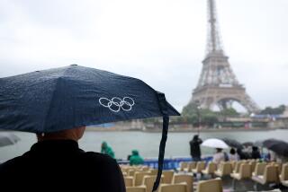 PARIS, FRANCE JULY 26, 2024 - A man waits for the 2024 Olympics opening ceremony.