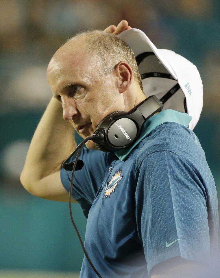 Miami Dolphins head coach Joe Philbin reacts during the first half of an NFL preseason football game against the Tampa Bay Buccaneers, Thursday, Sept. 3, 2015, in Miami Gardens, Fla. (AP Photo/Wilfredo Lee)