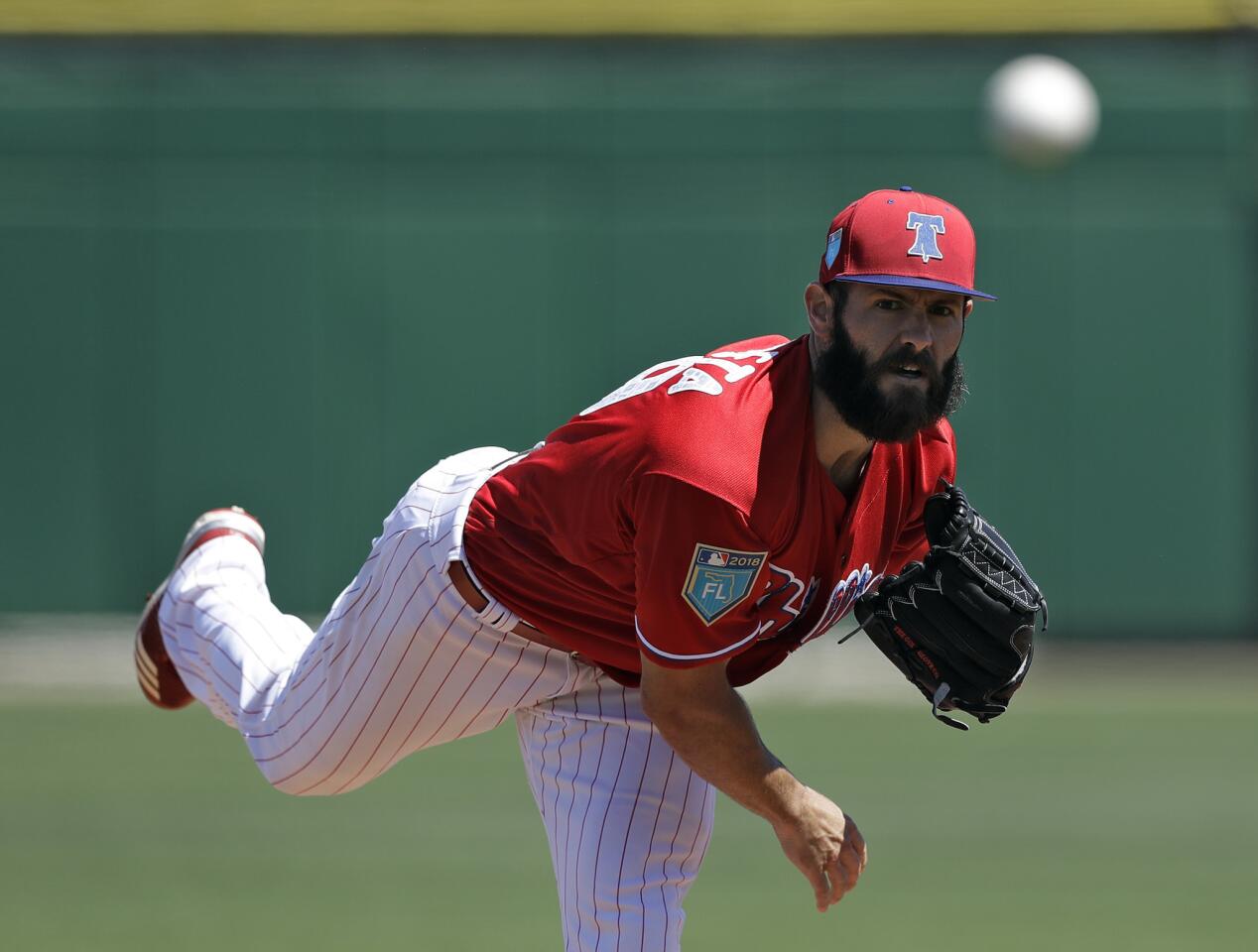 Phillies starting pitcher Jake Arrieta warms up before a spring training game against the Tigers on March 22, 2018, in Clearwater, Fla.